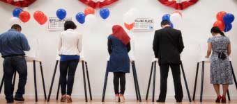 Diverse People Standing at Voting Polls