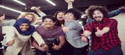 Group of Young Excited Multiethnics with Thumbs Up