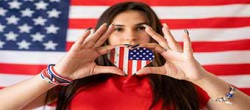Woman Holding a Heart Shaped USA Flag